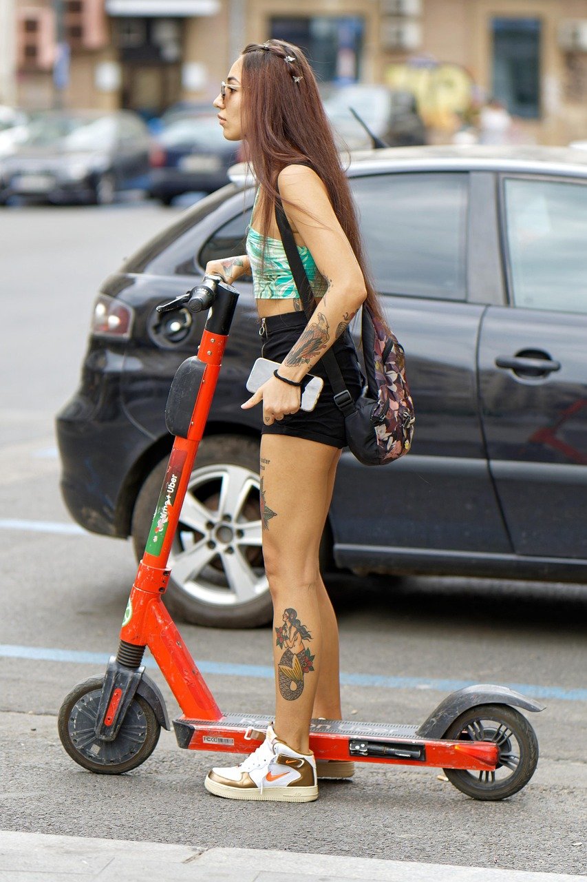 woman, scooter, road, town, traffic, coat, electric scooter, e-scooter, the street, urban, transport, lifestyle, scooter, electric scooter, electric scooter, electric scooter, electric scooter, electric scooter, e-scooter, e-scooter